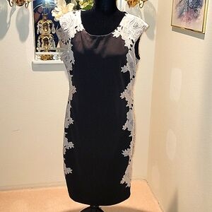 Black sheath dress with white lace applique by Jax.  Size 16. Fully lined.